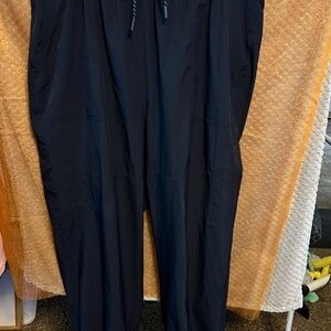 Brand: Never not Hustling beautiful navy blue color. Waist to ankle loose fit.